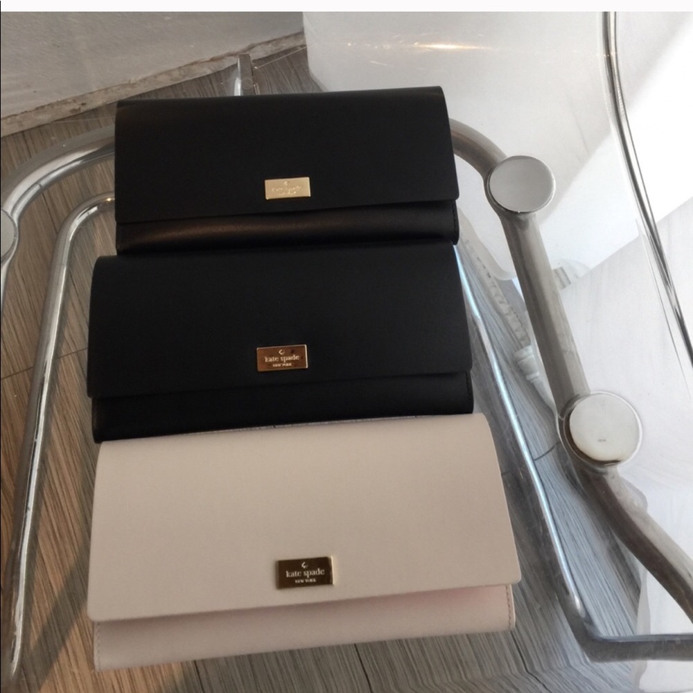 Katespade wallet never use.